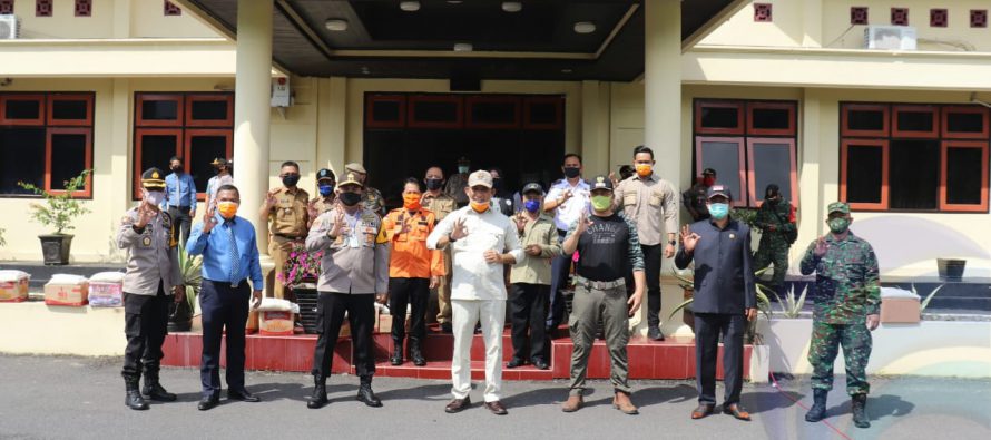 BUPATI OKU SELATAN HADIRI KEGIATAN BHAKTI SOSIAL #OKUSELATANPEDULICOVID-19  SEKALIGUS PENANDA TANGANAN KESEPAKATAN TENTANG PENDAMPINGAN DANA PENCEGAHAN DAN PENANGANAN COVID-19 DIKABUPATEN OKU SELATAN