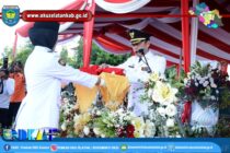 WAKIL BUPATI OKU SELATAN HADIR LANGSUNG DALAM PENURUNAN BENDERA PERINGATAN KE-77 TAHUN HARI PROKLAMASI KEMERDEKAAN RI TAHUN 2022